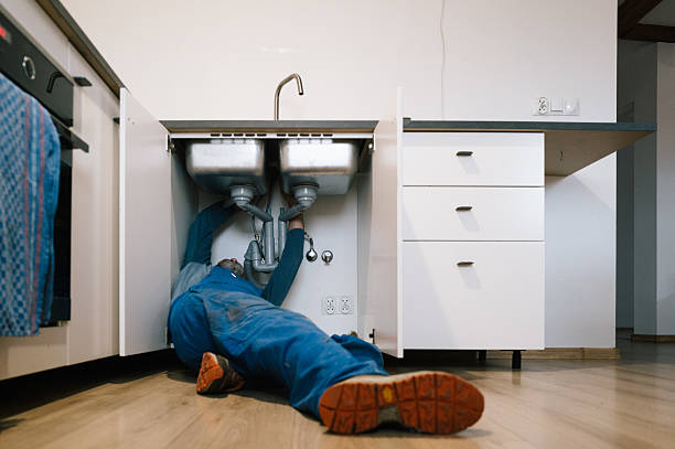 Professional Drain Cleaning technician working in Coloma, MI